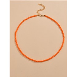 Оранжевое ожерелье из бусин